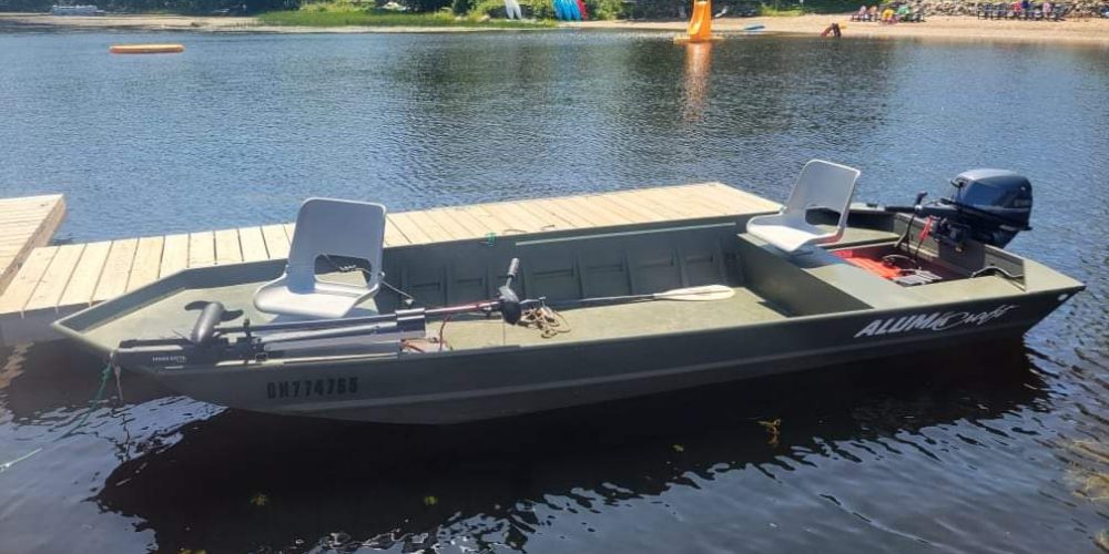 A power boat docked on water