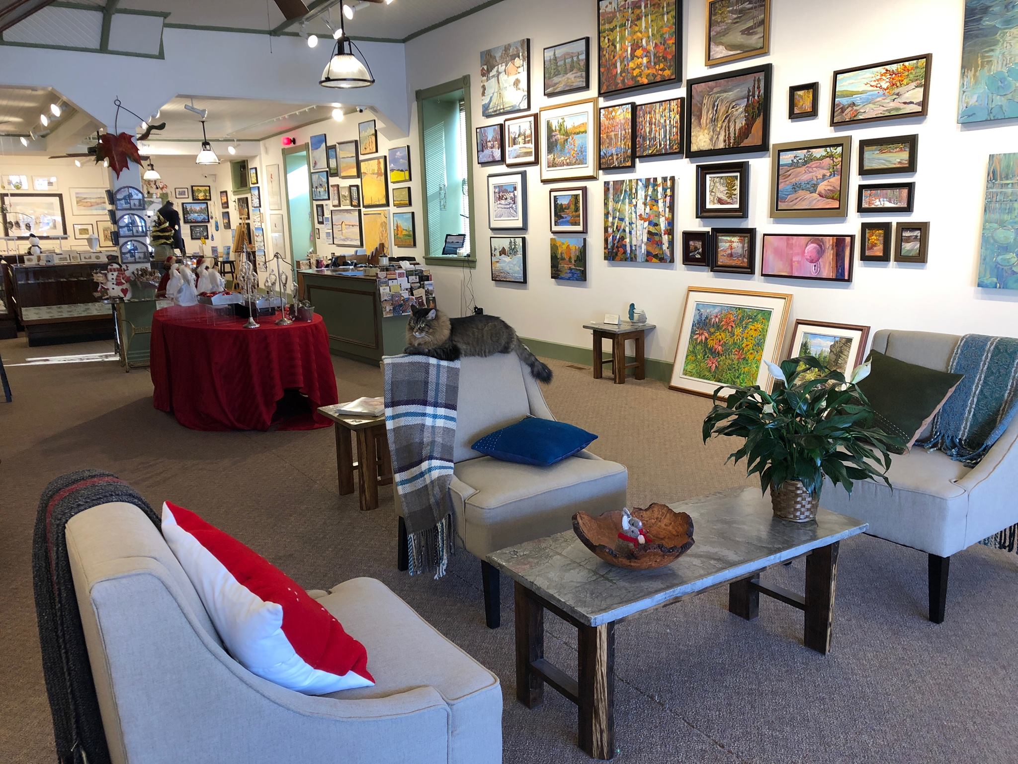 View of the interior of an art gallery with a nice seating area