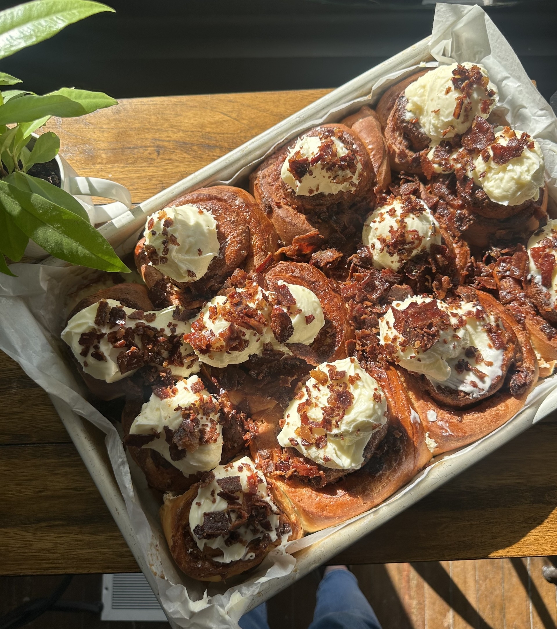 Maple Bacon Cinnamon Rolls on a tray