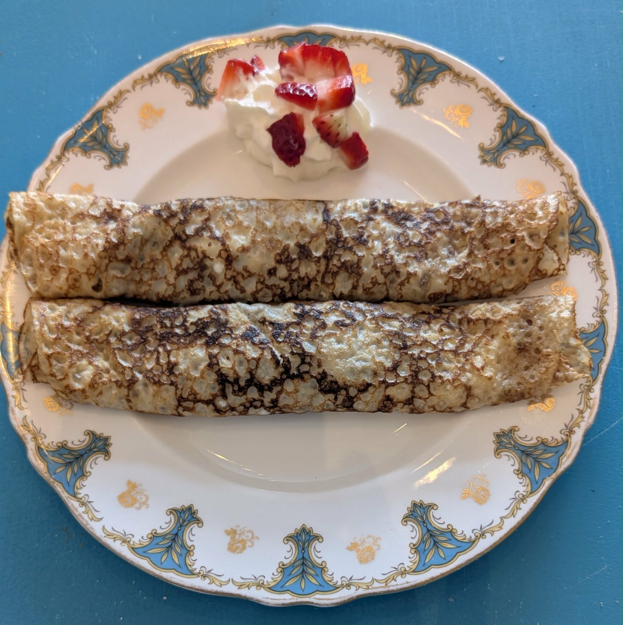 crepes on an antique style plate