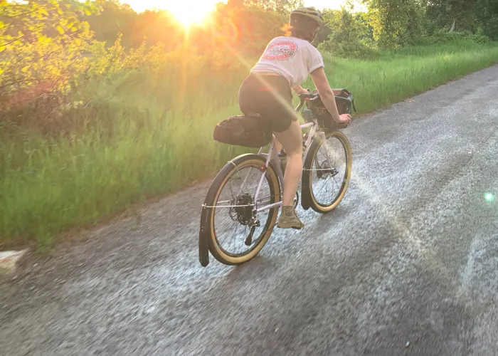 Person Cycling on Gravel