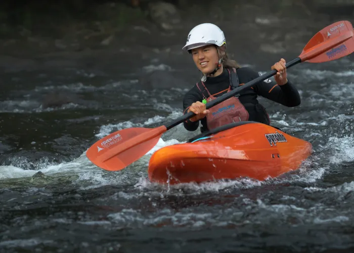 Person Paddling on Kayak