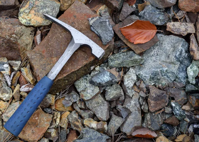 Rock pick geology rockhounding tool on rocks