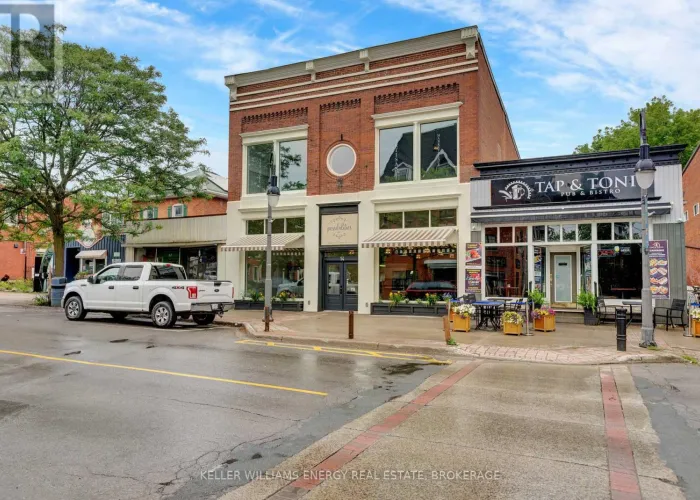 Front facade of a building in downtown Marmora that is vacant