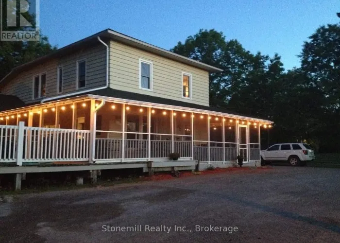 Front facade of the restaurant for sale in Coe Hill at night time