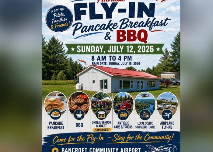 Photo of Bancroft Community Airport Hangar, event details, airport logo, yellow propellor plane flying