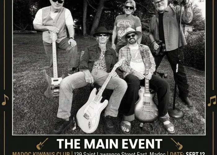 Black background, beige/gold thin border, black and white photo of five band members with their instruments posing together outdoors, event details, images of guitars, music notes, christmas tree and santa hat around outside