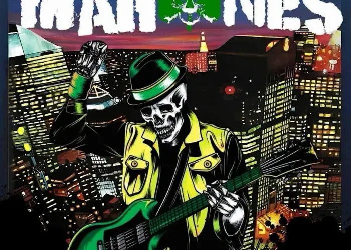 Skeleton dressed in yellow jacket and black hat with green band playing green guitar in front of cityscape, name of band