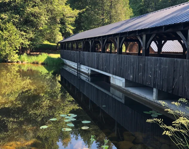 Covered Bridge overlooking the Mill Pond at O'Hara Mill Homestead and Conservation Area in Madoc, Ontario