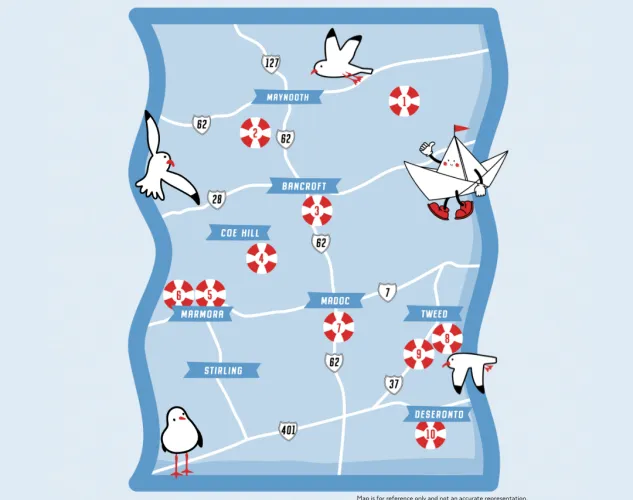 Cartoon style map with boat launch locations across Hastings County. The map is blue and has cartoon seagulls and a cartoon paper boat.